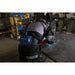 Worker using the CleanAIR CA-27 Yoga Welding Mask and Basic PAPR Kit in an industrial welding environment.